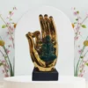 Buddha on Golden Hand