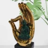 Buddha on Golden Hand