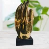 Buddha on Golden Hand Figure