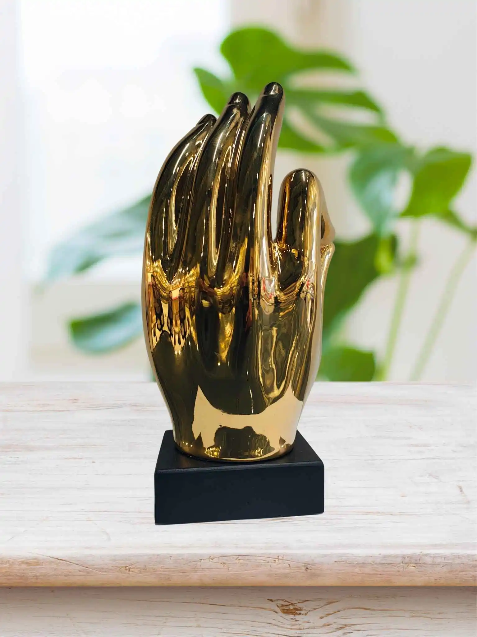 Buddha on Golden Hand Figure Buddha on Golden Hand Figure