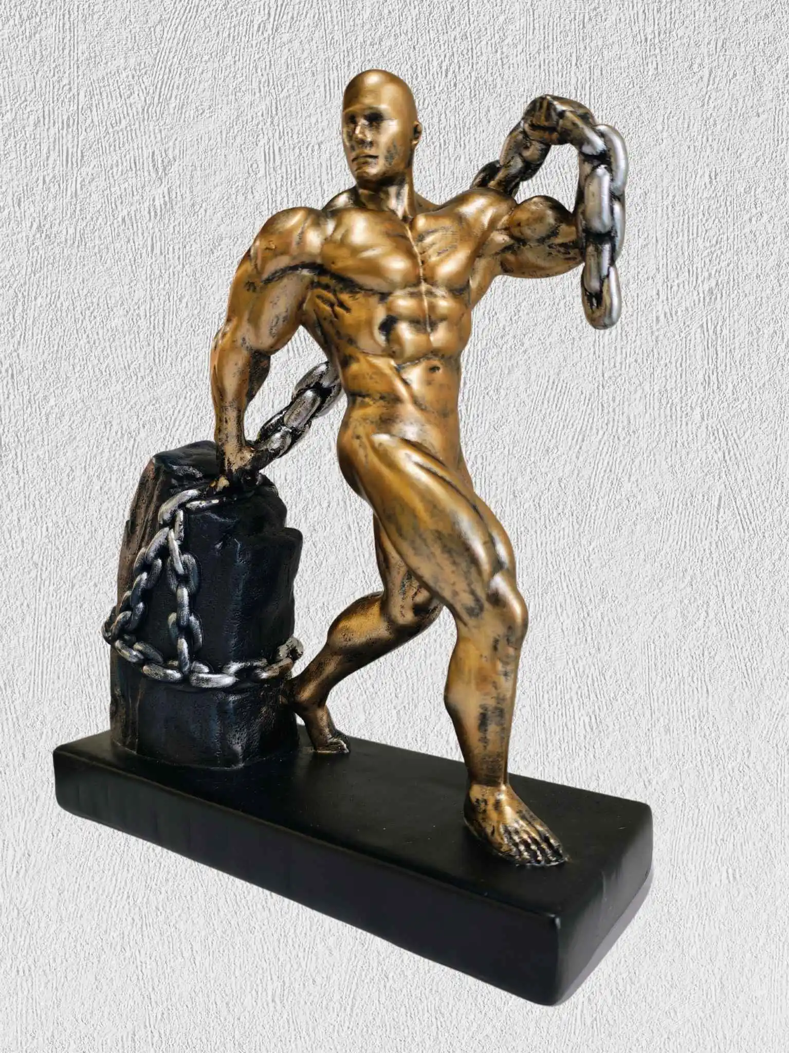 Muscle Man Pulling Rock Statue